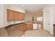 Kitchen with granite countertops and wood cabinets at 17020 E Kiwanis Dr # 102, Fountain Hills, AZ 85268