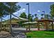 Outdoor bocce ball courts with shaded seating areas at 17129 N Silver Path, Surprise, AZ 85374