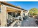 Patio with seating area, string lights and view to house at 17129 N Silver Path, Surprise, AZ 85374