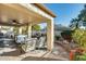 Covered patio with seating area and backyard access at 17129 N Silver Path, Surprise, AZ 85374