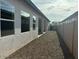 Charming backyard with gravel and a covered patio at 17380 W Carlisle Dr, Surprise, AZ 85388