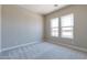 Spacious bedroom with neutral walls and carpet flooring at 17380 W Carlisle Dr, Surprise, AZ 85388