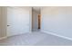 Bedroom with plush carpeting and double door closet at 17380 W Carlisle Dr, Surprise, AZ 85388