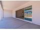 Spacious patio with sliding glass doors and view of backyard at 17380 W Carlisle Dr, Surprise, AZ 85388