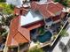 Aerial view of a beautiful home with a private pool and spa surrounded by lush landscaping at 17459 N 79Th St, Scottsdale, AZ 85255