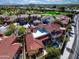 Beautiful aerial view of a home with a private pool, spa and desert landscaping at 17459 N 79Th St, Scottsdale, AZ 85255