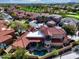 Aerial view of a beautiful home with a private pool and spa in a golf community at 17459 N 79Th St, Scottsdale, AZ 85255