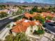 Aerial view of beautiful red-tiled home in a golf community with mountain views at 17459 N 79Th St, Scottsdale, AZ 85255