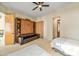 Spacious bedroom with a built-in sofa bed and private bathroom access at 17459 N 79Th St, Scottsdale, AZ 85255