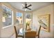 Bright breakfast nook with glass table and seating for four at 17459 N 79Th St, Scottsdale, AZ 85255