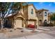 Well maintained home with a two-car garage and red flowers at 17459 N 79Th St, Scottsdale, AZ 85255