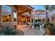 Relaxing patio area with seating, pool view, and outdoor lighting at 17459 N 79Th St, Scottsdale, AZ 85255