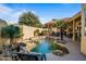 Inviting backyard oasis featuring a kidney-shaped pool and patio furniture at 17459 N 79Th St, Scottsdale, AZ 85255