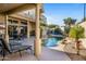 Spacious backyard with a relaxing pool and patio furniture at 17459 N 79Th St, Scottsdale, AZ 85255