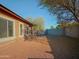 Landscaped backyard with gravel and block wall at 1933 S Peppertree Dr, Gilbert, AZ 85295