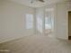 Bright bedroom with carpet flooring and ensuite bathroom access at 1933 S Peppertree Dr, Gilbert, AZ 85295