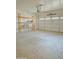 Garage with storage shelving and an automatic door at 1933 S Peppertree Dr, Gilbert, AZ 85295