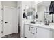 Elegant bathroom with double vanity and separate toilet at 20838 W Granada Rd, Buckeye, AZ 85396