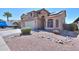 Two-story house with solar panels, landscaping, and driveway at 21404 N Van Loo Dr, Maricopa, AZ 85138