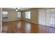 Gathering room with hardwood floors and sliding glass door at 21404 N Van Loo Dr, Maricopa, AZ 85138