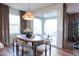 Dining area with sliding glass door leading to patio at 2191 N Iowa St, Chandler, AZ 85225