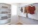 Bright walk-in closet with ample shelving and hanging space at 2191 N Iowa St, Chandler, AZ 85225