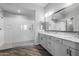 Bathroom with double vanity, large shower, and marble counters at 22852 E Thornton Rd, Queen Creek, AZ 85142