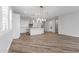 Modern dining area with light wood table and chairs near the kitchen at 22852 E Thornton Rd, Queen Creek, AZ 85142