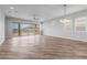 Bright and airy living room with sliding doors leading to the backyard at 22852 E Thornton Rd, Queen Creek, AZ 85142