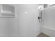 Large walk-in shower with built-in seat at 22852 E Thornton Rd, Queen Creek, AZ 85142