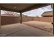 Covered patio with view of backyard and neighboring homes at 22878 E Carriage Way, Queen Creek, AZ 85142