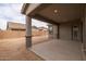 Covered patio with access to backyard and home at 22878 E Carriage Way, Queen Creek, AZ 85142