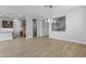 Elegant dining room with hardwood floors and a stylish chandelier at 22878 E Carriage Way, Queen Creek, AZ 85142