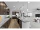 Modern kitchen with stainless steel appliances and an island at 22878 E Carriage Way, Queen Creek, AZ 85142