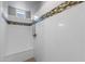 Clean shower with built-in seat and mosaic tile detail at 22878 E Carriage Way, Queen Creek, AZ 85142