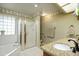 Bathroom with granite countertops, a shower, and a bathtub at 2544 S Daisy --, Mesa, AZ 85209