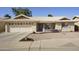 Single-story home with two-car garage and desert landscaping at 2544 S Daisy --, Mesa, AZ 85209