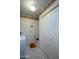 Laundry room with toilet and extra storage at 2544 S Daisy --, Mesa, AZ 85209