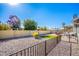 Spacious backyard with artificial turf and patio area at 3235 W Irma Ln, Phoenix, AZ 85027