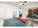 Bright bedroom with mirrored closet doors and neutral decor at 3235 W Irma Ln, Phoenix, AZ 85027