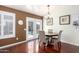 Bright dining area with a round table and four chairs, near the kitchen at 3235 W Irma Ln, Phoenix, AZ 85027