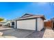 Two-car garage with paver walkway at 3235 W Irma Ln, Phoenix, AZ 85027