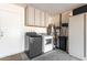 Convenient laundry area with washer, dryer, and storage at 3235 W Irma Ln, Phoenix, AZ 85027