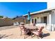 Outdoor patio with seating and umbrella at 3235 W Irma Ln, Phoenix, AZ 85027