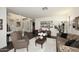 Elegant living room with hardwood floors, a view of the entryway, and comfortable seating at 3267 E Maplewood St, Gilbert, AZ 85297