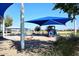 Community playground with shade structures, play equipment, and picnic area at 3267 E Maplewood St, Gilbert, AZ 85297