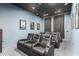 Home theater with comfortable reclining seats, perfect for movie nights at 3302 N 7Th St # 208, Phoenix, AZ 85014