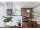 Charming dining area with brick feature wall and wooden table at 3302 N 7Th St # 208, Phoenix, AZ 85014