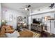 Living room with a sectional sofa, decorative shelving and wood floors at 3302 N 7Th St # 208, Phoenix, AZ 85014