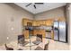 Community kitchen with stainless steel appliances and a breakfast bar at 3302 N 7Th St # 208, Phoenix, AZ 85014